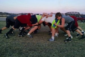 Siouxland United Wolves practicing a scrum. 