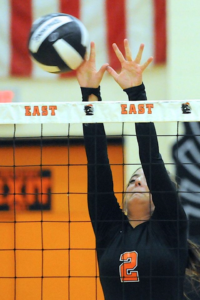 Sioux City East junior, Kennedy Franko, blocks the gall in Thursday nights contest.