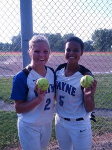 Taylor Gamble and Shannon Holdorf Gibson of Wayne holding their home run balls in their 2-1 win over highway 91. This win was the beginning of their 14 game win streak. 