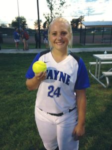 Kortney Keller of Wayne holding the grand slam ball she hit in the 8-0 win over Columbus Lakeview.